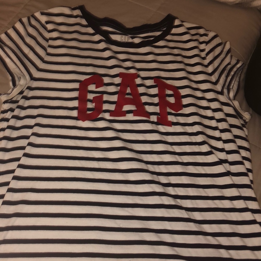 blue and white stripped shirt with red “gap”